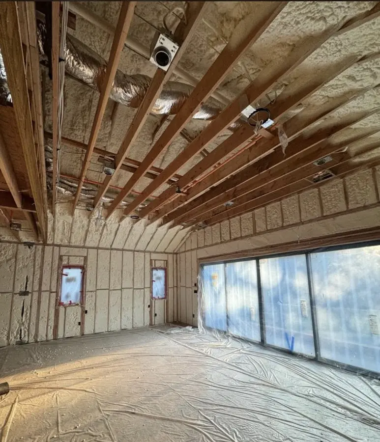 Interior walls and ceiling insulated with spray foam during new construction in Oviedo